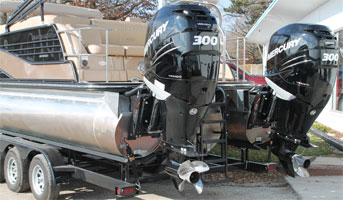 Stern Harris Pontoon boat on trailer